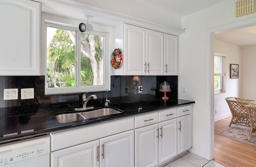 Jog Road House | Charming redone house just minutes from beach…