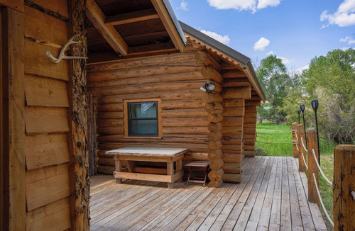 Dubois Cabin | Charming riverfront 2-bedroom cabin in enchanting Dubois with WiFi