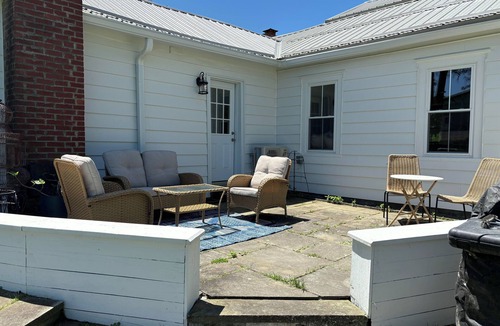 Etna House | Charming & serene, this farmhouse has it all, offering stylish comfort, a sunny private backyard, and a prime location to Cayuga lake and gorges Ithaca.