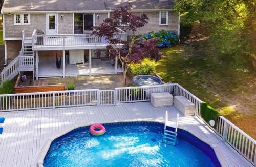 East Dennis House | Charming & spacious Cape Cod Eden by the beach with pool, hot tub & fireplace