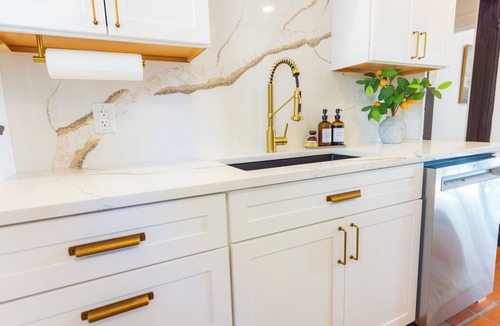 Sayles Blvd. Area House | Charming Spanish Revival Villa, Historic Sayles Neighborhood, Sleeps 8!
