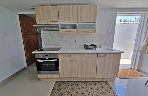 Oistins Apartment | Charming studio in quiet, adorable location in Christ Church with WiFi, AC & TV.