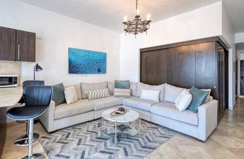 Libertad Apartment | Charming & sunlit condo with pool & balcony - near golf, beaches, & nightlife