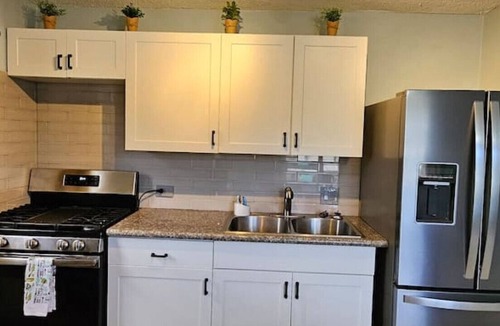 Estate Sion Farm House | Charming Sunny Isle Escape, Private Patio, Office and Smart TVs in Every Room!
