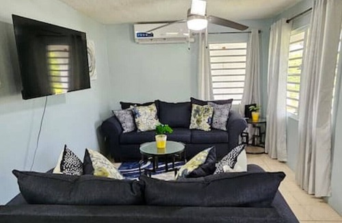 Estate Sion Farm House | Charming Sunny Isle Escape, Private Patio, Office and Smart TVs in Every Room!