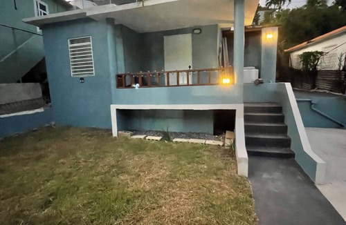 Florida Afuera House | Charming Tiny little blue house 2-bedroom house in peaceful Barceloneta with AC