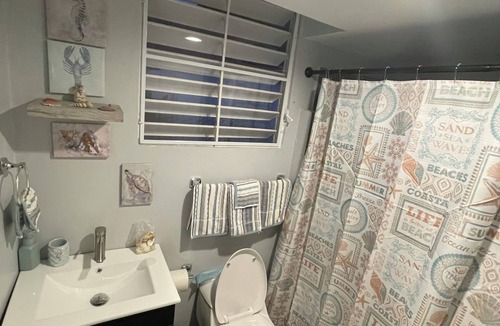 Florida Afuera House | Charming Tiny little blue house 2-bedroom house in peaceful Barceloneta with AC