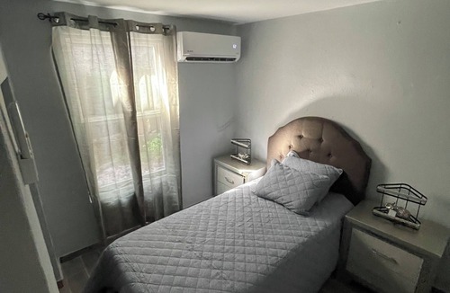 Florida Afuera House | Charming Tiny little blue house 2-bedroom house in peaceful Barceloneta with AC