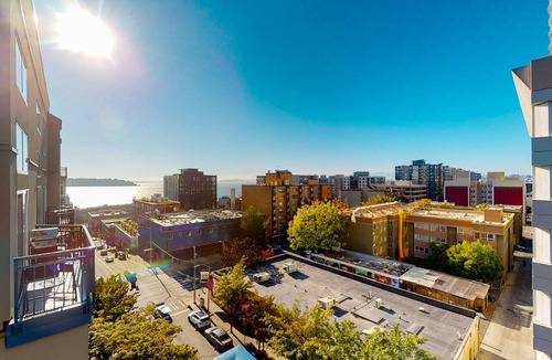 Belltown Condo | Charming top floor 2 story penthouse with Sound and Olympic views