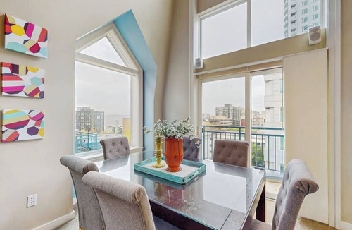 Belltown Condo | Charming top floor 2 story penthouse with Sound and Olympic views