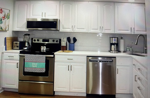 Jupiter House | Charming townhome in a vibrant and active gated golf community in Jupiter.