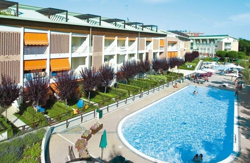 Bibione Pineda Apartment | Charming two level vacation home with solarium