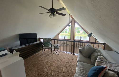 Arnolds Park House | Charming upscale vacation cottage on the pond in the Bridges Bay Resort property
