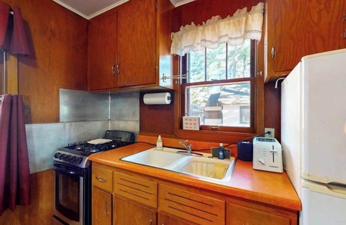 Manitowish Waters House | Charming waterfront cottage with shared firepit, canoe, paddlebaot & docks