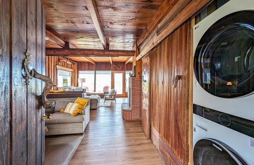 Oak Harbor House | Charming water view retreat with a wood-burning fireplace, deck, grill, and W/D