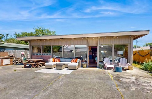 Oak Harbor House | Charming water view retreat with a wood-burning fireplace, deck, grill, and W/D