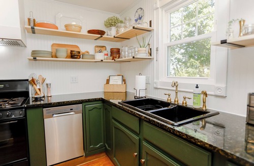 Edwardsville Cottage | Charming Waterfront 3-Bedroom Cottage with Hot Tub, Kayaks, Workspace, Fishing