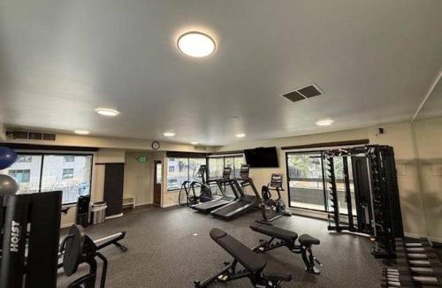 Aspen House | Chateau Eau Claire Unit 1, Stylish Condo Overlooking the River, Walking Distance to Downtown