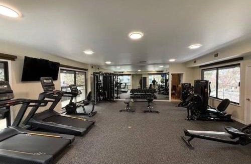 Aspen House | Chateau Eau Claire Unit 1, Stylish Condo Overlooking the River, Walking Distance to Downtown