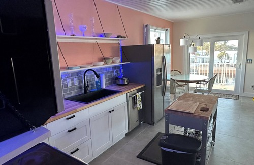Key West House | Cheerful home with waterfront canal and boat dock on Big Coppit key- 28 day min