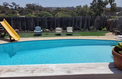 Townsite Cottage | Cheerful,quiet, 2bd 1 bath home + patio, pool, , walk to beach