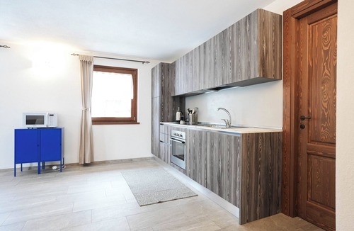 Morgex Apartment | Cherry Tree House. Cozy and modern, nestled in the tranquility of the Alps
