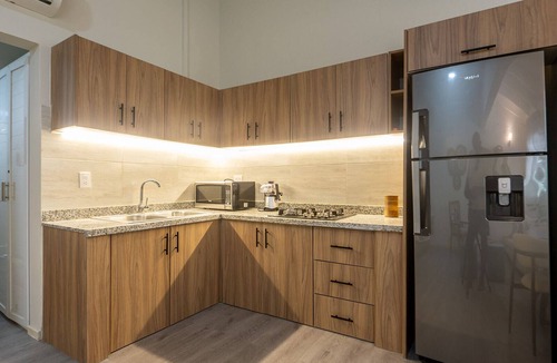 La Iglesia Apartment | Chic-1 bed apt inside lux condo w/wifi, AC, pool, tropical gardens!