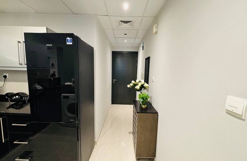 Business Bay Apartment | Chic 1-bedroom apartment in enchanting Dubai with WiFi, AC, fitness room