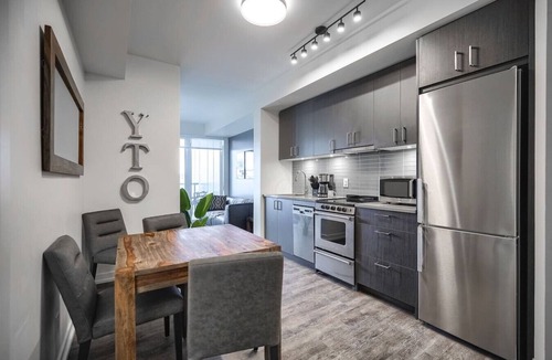 Bay Cloverhill Apartment | Chic 2BR Oasis with Skyline Views near Berczy Park
