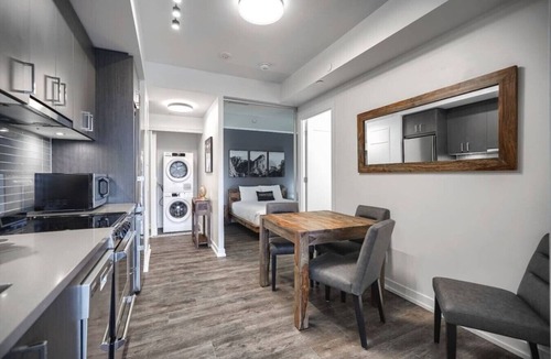 Bay Cloverhill Apartment | Chic 2BR Oasis with Skyline Views near Berczy Park