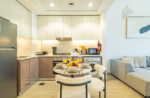 Nad Al Sheba Apartment | Chic 2BR with Partial Burj Khalifa View