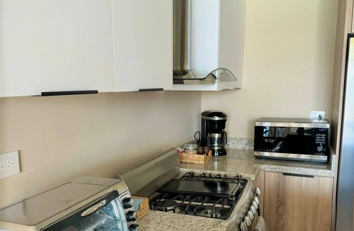 Punta Cana Condo | Chic Boho Apartment Overlooking Crystal Lagoon