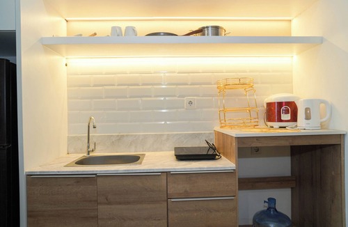 Panunggangan Utara Apartment | Chic Brown Touch Studio At Apartment Collins Boulevard