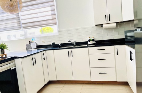 West Coast Condo | Chic Condo in Central Location—Pool, Gated, WiFi