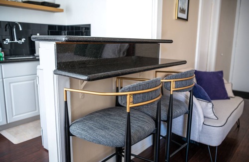 East Village Apartment | Chic Condo w Parking, AC and steps to Beach and Convention Center
