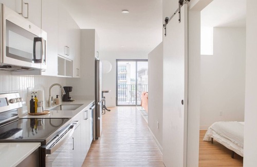 Yankee Hill Apartment | Chic East Side 1BR Apt with Balcony, Pool, and Gym