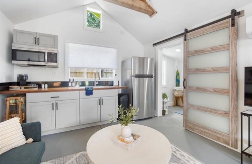 River District Apartment | Chic King Studio Near Anna Maria Island. Parking & Beach Gear Included