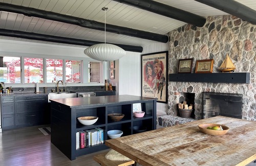 Northport Cottage | Chic log home, styled with flair, updated with modern amenities.