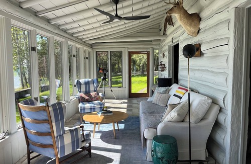 Northport Cottage | Chic log home, styled with flair, updated with modern amenities.