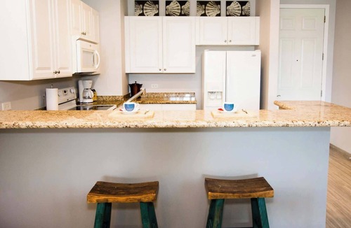 Coco Condo | Chic Minimalist Condo with Swimming Pool, Hot Tub, and Beach Club Access