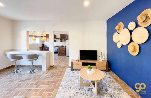 El Centenario Apartment | Chic Studio Kitchen WiFi TV Steps to Beach