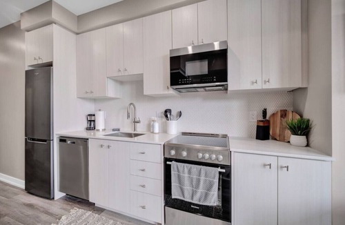 Kitchener Condo | City Views & Private Balcony | Gym, Pool & More!