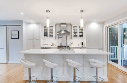 Quogue House | Classic Shingled Cape in Quogue, Private Pool, Expansive Deck, Prime.