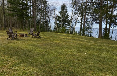 Rapid River Cabin | Classic UP Cabin with Lake Views, Private Beach, Fire Pit