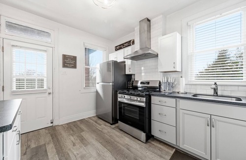 Brighton Heights Apartment | Clean, comfortable 2BR in a quiet neighborhood near downtown and stadiums. Guests love the spotless space, thoughtful touches, and fully stocked kitchen. Enjoy fast WiFi, smart TVs, easy check-in, free parking, plus a porch and private balcony.