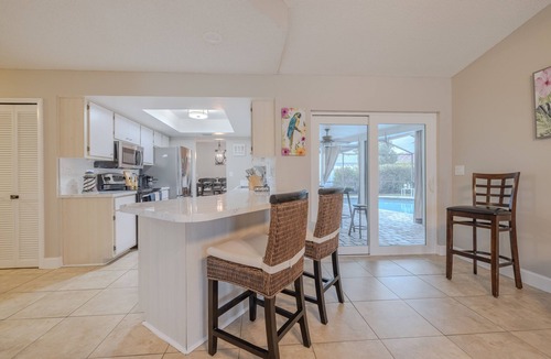 Lochmoor Waterway Estates House | Clean pool house with 70" TV nearby beaches, shopping and restaurants
