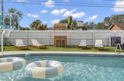 Clearwater House | Clearwater ICONIC Heated Pool Home, Mini Golf, Sleeps 11