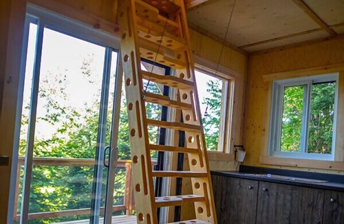 Saint-Faustin-Lac-Carre House | Cliffside treehouse, upper floor bedroom, lake view | Lodging #17