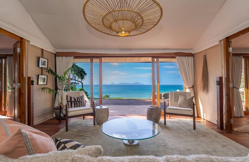 Langs Beach Cabin | Clifftops - luxury tented lodge, sweeping views & beach, 90 mins from Auckland