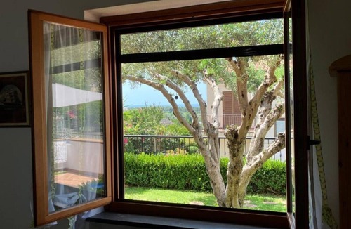 Marina di Maratea Apartment | Close to the most convenient and breezy beach in Maratea, with garden and terrace.